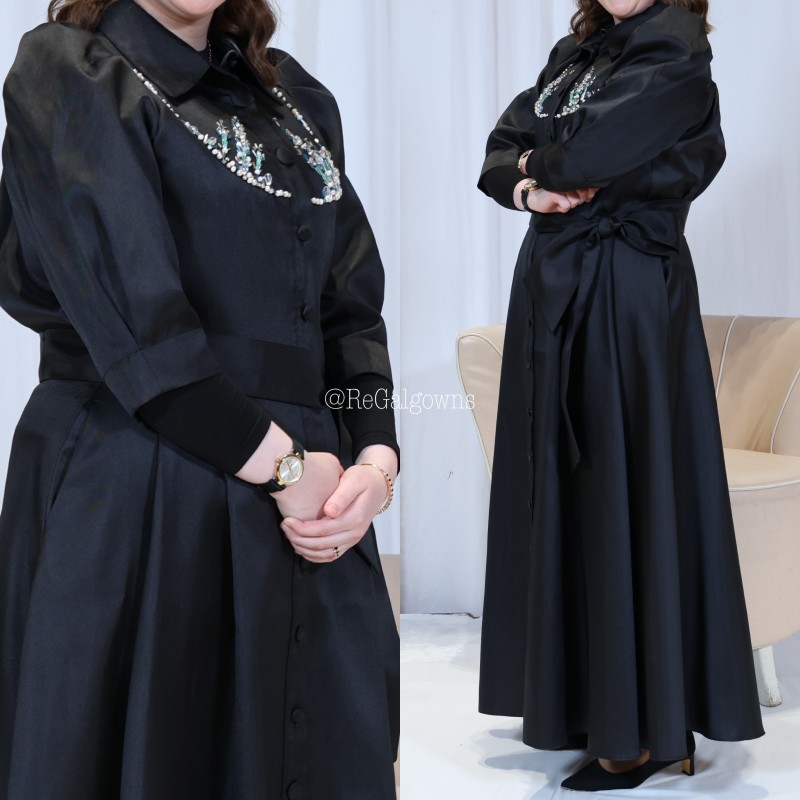 Black satin gown with teal crystal beading