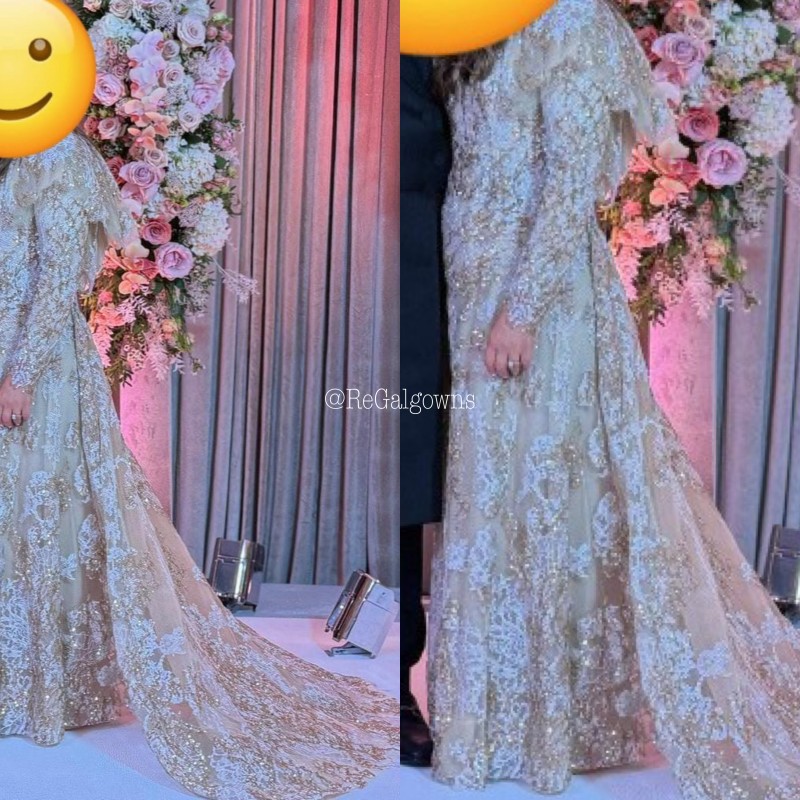 Beautiful fully beaded dress with a flowing train at the back. Bought at Michal Miller.